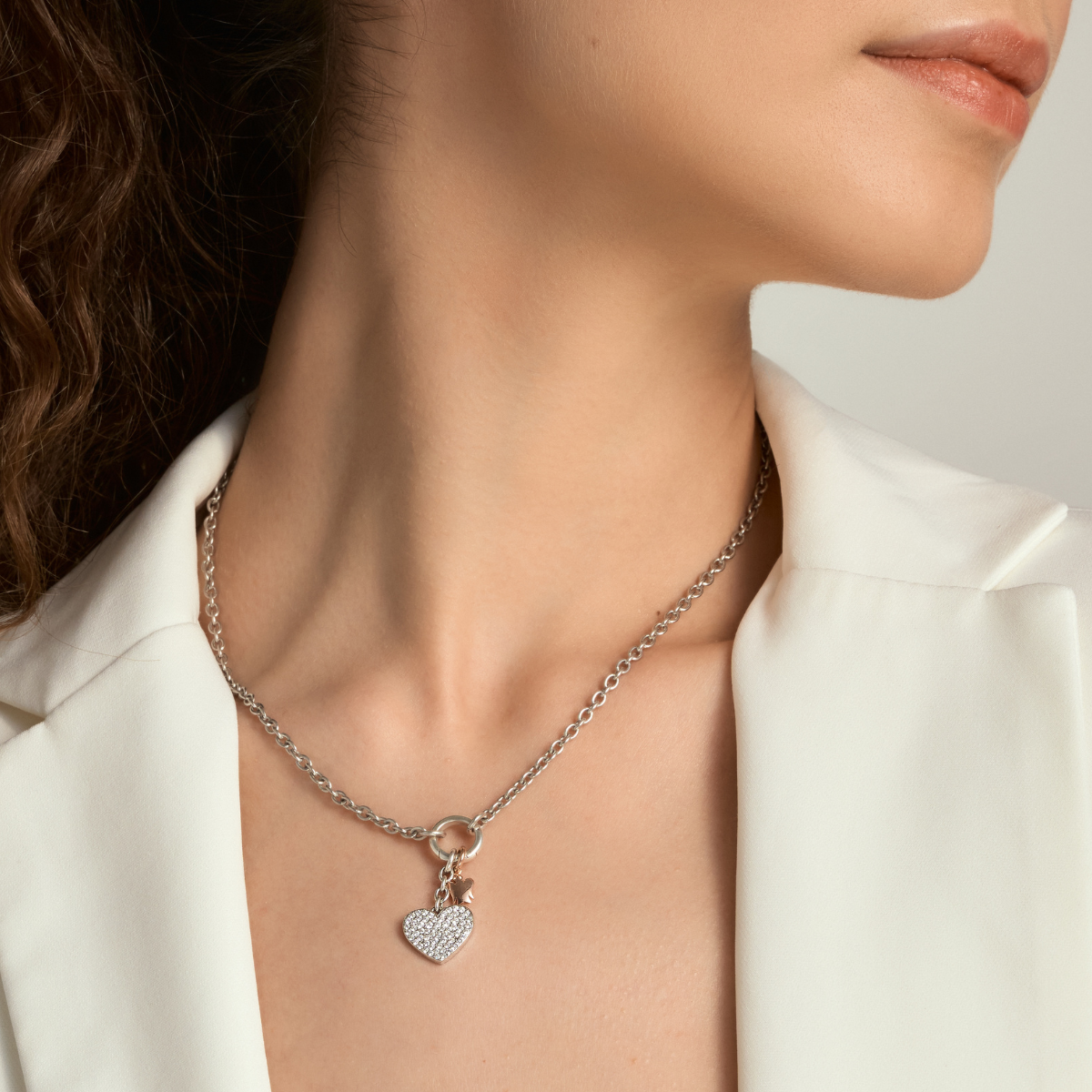 Collana con chiusura ad anello, cuore charm e angelo
