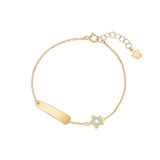 Gold bracelet with tag and blue star