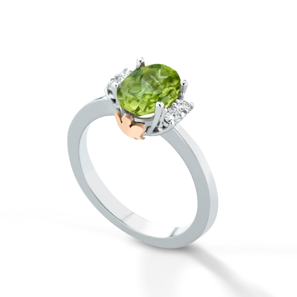 Anello in oro bianco, diamanti e peridoto