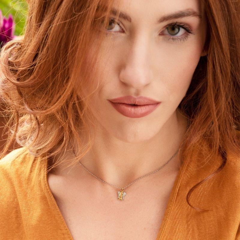 Collana In Oro Bianco Con Pendente Angelo In Oro Bianco E Giallo E Diamanti - Roberto Giannotti